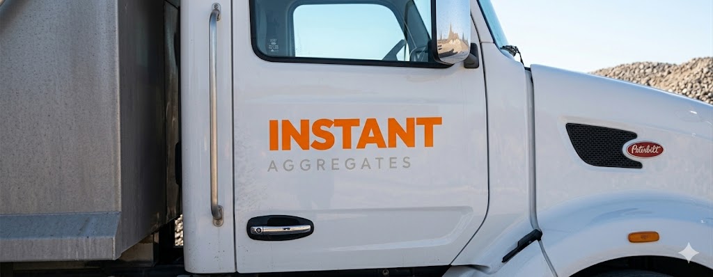 Instant Aggregates branded delivery truck at an aggregate yard in British Columbia
